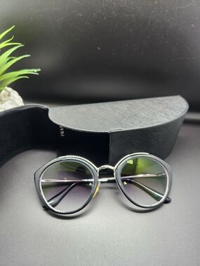 Prada Black Frame Sunglasses with Smokey-Tinted Lenses